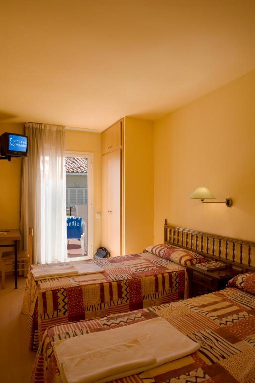 Hotel Central Normandie Sitges Pokoj fotografie